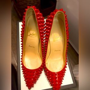 Authentic Worn once Christian Louboutin leather studded signature heels